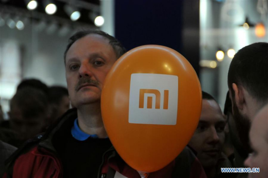 Customers wait for the opening of Xiaomi's first authorized store in Krakow, Poland, March 24, 2018. (Xinhua/Shi Zhongyu)