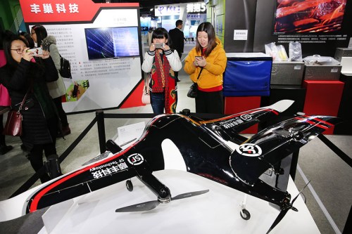 Leading courier SF Express displays its drone at an information technology exhibition. (Photo by Xu Congjun/for China Daily)