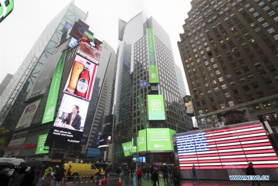 Advertisements of iQiyi are seen on several screens at Times Square in New York, the United States, on March 29, 2018. Chinese video streaming service iQiyi Inc. rang the Nasdaq Stock Market opening bell on Thursday in celebration of its initial public offering (IPO). (Xinhua/Wang Ying)