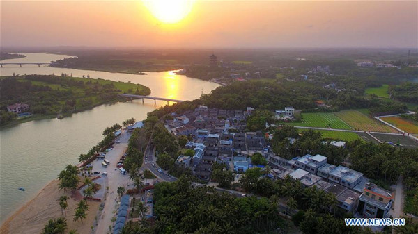 Aerial photo taken on March 24, 2018 shows scenery of Nanqiang village in Boao town, South China's Hainan province. The Boao Forum for Asia annual conference will take place in Hainan in April, and focus on reform and opening-up. (Photo/Xinhua)