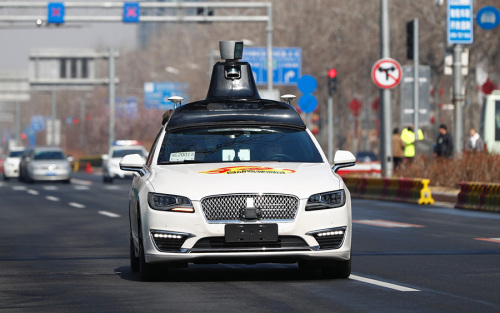 An autonomous car is tested in Beijing in March. (Photo: CHENG GONG/FOR CHINA DAILY)