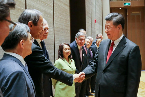 President Xi Jinping meets with current and incoming members of the board of directors of the Boao Forum for Asia on Wednesday in Hainan province. The president had many kind words to share about the forum. (Photo/ CHINA DAILY)