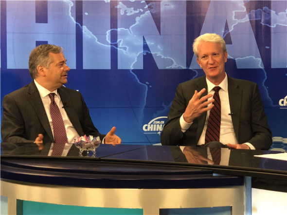 Chris McGurk (right), chairman and CEO of Cinedigm, one of the largest independent studios in the United States, and Bill Sondheim, president of Cinedigm's Entertainment Group, talk about the globalization of Chinese films on Easy Talk, a video show broadcast on China Daily website. (Photo: China Daily/ Yu Xiaoou)