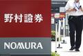 Japanese securities trader Nomura plans to set up holding firm in China