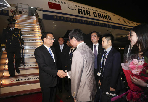 Li's trip includes trilateral meeting, official visit to Japan