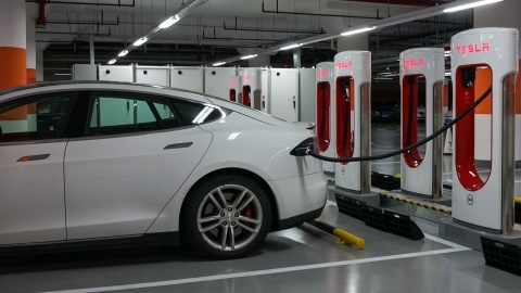 Tesla drives into Shanghai to capitalize on car reforms