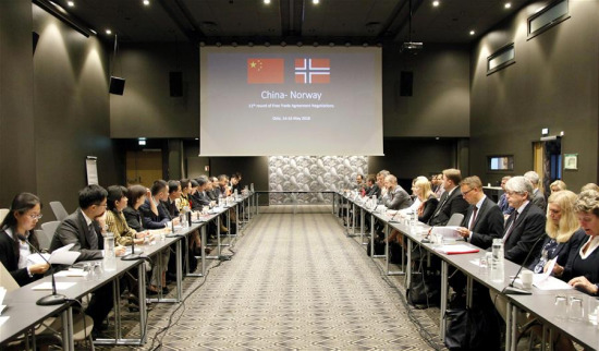 Photo taken on May 14, 2018 shows the view of a meeting during the 11th round of free trade agreement negotiations between China and Norway in Oslo, Norway. China and Norway on Wednesday completed their latest round of negotiations for a free trade agreement and positive progress has been made. (Xinhua/Liang Youchang)