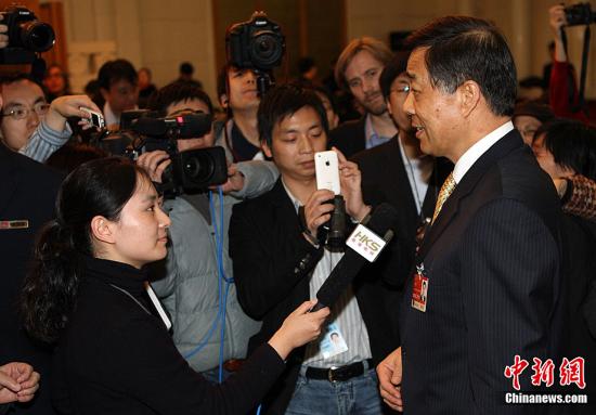 Chongqing CPC Secretary Bo Xilai and Mayor Huang Qifan interacted with the media on the municipal policy goals. (CNS photo/Ren Chenming)