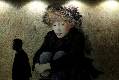 A man looks at Andrew Wyeth 'Faraway' on display during a Christie's spring auction preview in Hong Kong. Christie's spring auctions held in May present Asian art, paintings, ceramics and rare luxury jewellery. AFP PHOTO / Dale de la Rey.