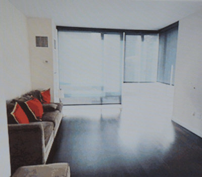 Photo provided by auction organizers shows the inside of the apartment. [Photo/ Worldjournal.com]