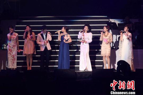 Singers perform during a memorial concert for Teresa Teng held in the Taipei Arena, May 12, 2013.