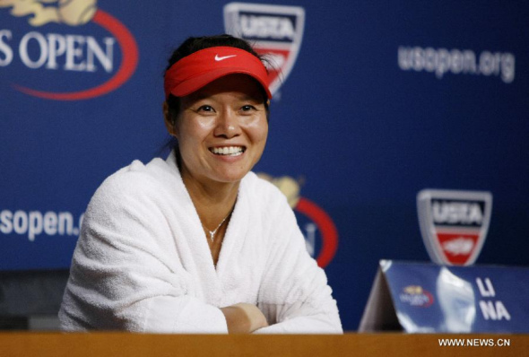 Li Na of China reacts during the press conference after the women's singles 4th round match against Jelena Jankovic of Serbia at the 2013 US Open tennis championships in New York, the United States, on Sept. 1, 2013. Li Na won 2-0 to enter the next round. (Xinhua/Fang Zhe) 