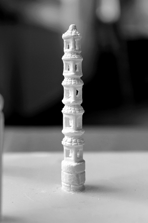 Photo shows the six-story hollowed-out miniature tower made out of a chalk.
