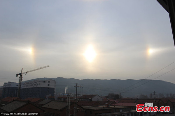 Three suns appear on Friday morning in the cities of Chengde in Hebei province and Chifeng of Inner Mongolia autonomous region. [Photo/CFP]