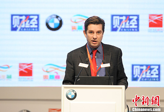 Rupert Hoogewerf makes a speech at the 2013 China Philanthropy Forum held in Beijing on Monday. (Photo: CNS/Hou Yu)