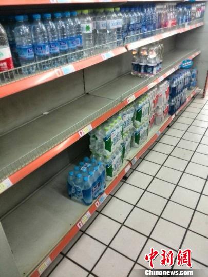 Bottled water left on shelves of super market. 