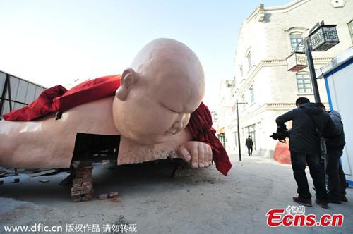 Sculptures of naked Buddhas removed after two-day appearance 