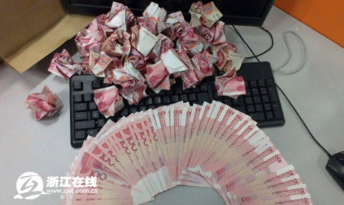 Paper roses folded out of paper notes. 