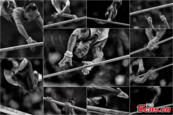 Competition on bars by Jia Guorong with China News Service won the 1st Prize in Sports Action Stories category at the 57th annual World Press Photo Contest. [CNS Photo]