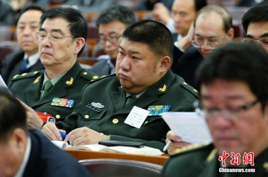 Combating judicial corruption represents the key word in a proposal from Chairman Mao Zedongs grandson Mao Xinyu, a member of the Chinese People's Political Consultative Conference (CPPCC), at this year's two sessions.(Photo source: chinanews.com)