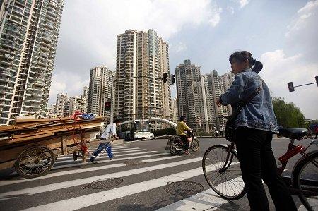 A large number of  high residential buildings can be seen in China's cities and towns, which are also symbols of China's urbanization. (Photo source: chinanews.com) 