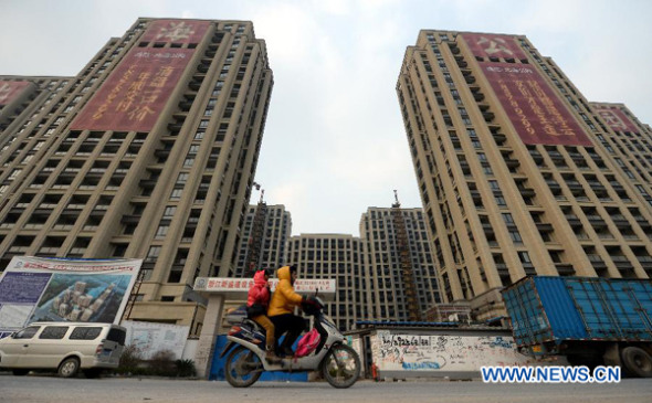 This undated file photo shows appartments in the buildings are ready for sale. [Photo /Xinhua]