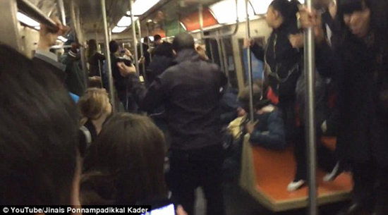 Screenshot of a video shows a rat on the subway of New York, US terrifies riders on April 7, 2014. [Photo: CRI]