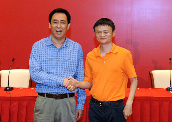Alibaba's founder Jack Ma (right) and Evergrande's director Hui Ka Yan at the press conference. (Photo: Cnwest.com)