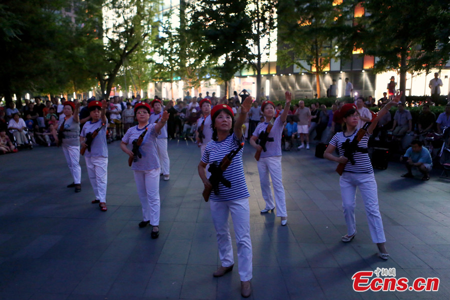 Chinese 'dama' dance like anti-Japanese soldiers in Beijing 