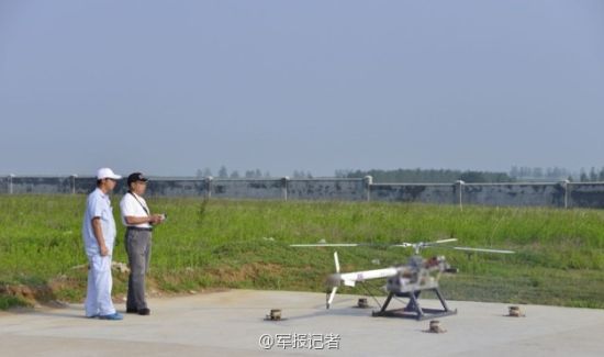 China's first unmanned gyroplane has successfully finished its maiden flight with a parachute landing. (Photo: PLA Daily)
