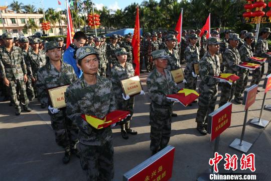 Sansha's national flag guard teams for islands are officially set up on Sep 29, 2014. (Photo: chinanews.com)