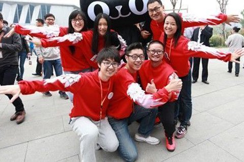 Workers in fake hoodies pose in anticipation of the annual Singles Day sales. (Photo: bjnews.com.cn)