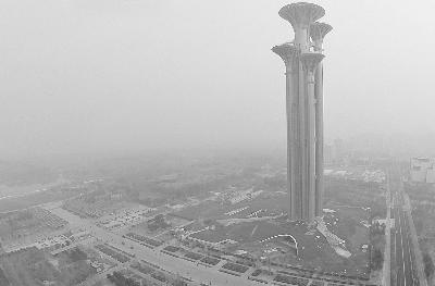 Beijing Olympic Forest Park is shrouded by smog on Wednesday morning. (Photo: Legal Evening News)