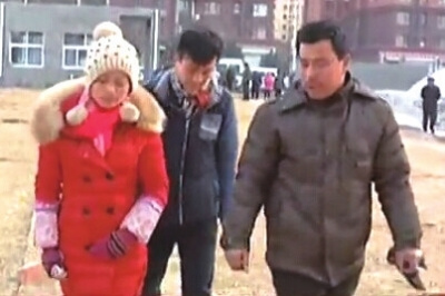 Victims are seen on their way to a police station. (File photo/Chinanews.com)