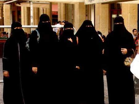 People with full-face veils are seen in this file photo. 