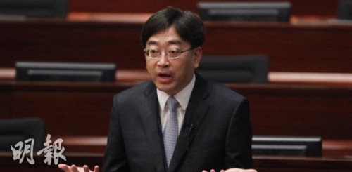 Ko Wing-man, Hong Kong's Secretary for Food and Health, speaks at a meeting on Feb 4, 2015. (Photo: Ming Pao Daily)