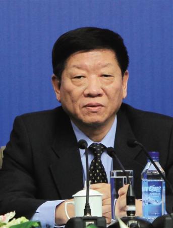 Yin Weimin, Minister of Human Resources and Social Security, addresses a press conference on employment and social security held during the third session of the twelfth National Peoples Congress on Monday. (Photo/Beijing News)