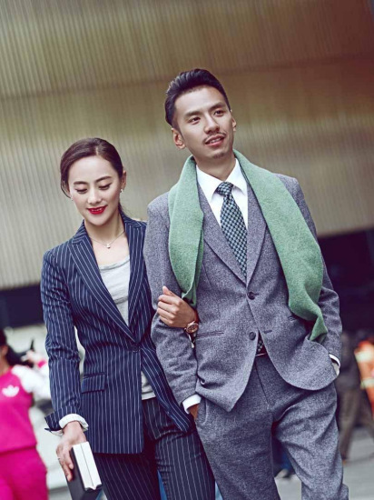 Kalsang Phuntsok and his wife Dawa Dolma in business suits.(Photo/www.ynet.com)