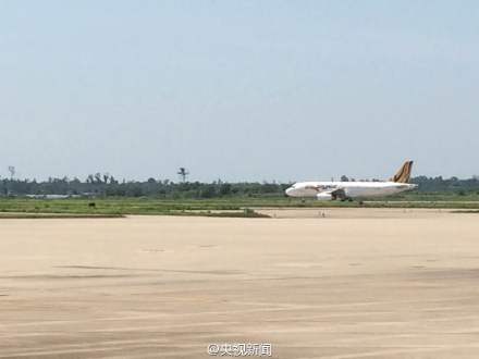 The Airbus A320 performing flight TR2934 lands in Haikou on Thursday, June 11, 2015. (Photo from verified Weibo account of China Central Television)