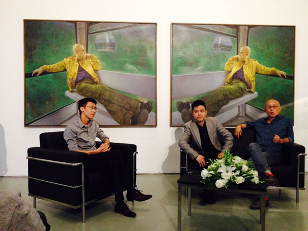 Artist Pang Maokun (M), curator Sheng Wei (L) and art critic Yu Ke (R) at the opening ceremony in Today Art Museum on Thursday, Sept. 24. (Photo: ECNS/Qian Ruisha)