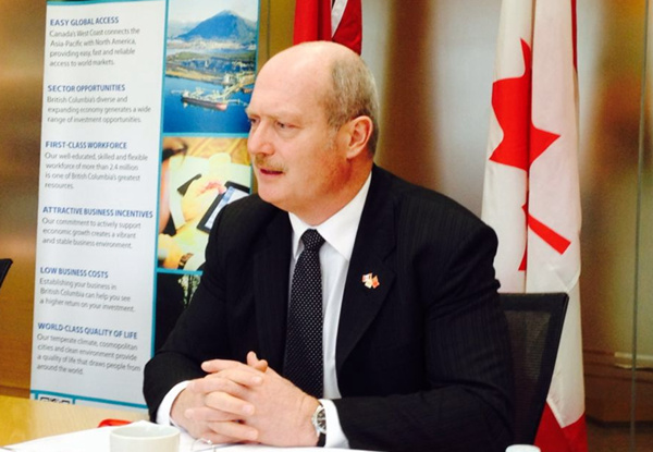 British Columbia Finance Minister Michael de Jong briefs the media in Beijing on Dec. 3, 2015. (Photo: ECNS/Qian Ruisha)