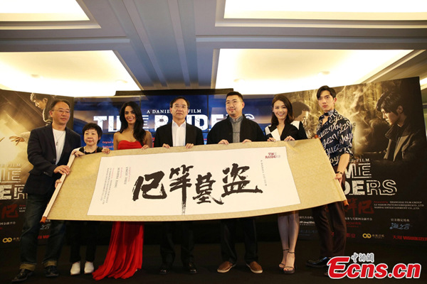 Film crew of Time Traiders pose for photos in Cannes. (Photo provided to Ecns.cn)