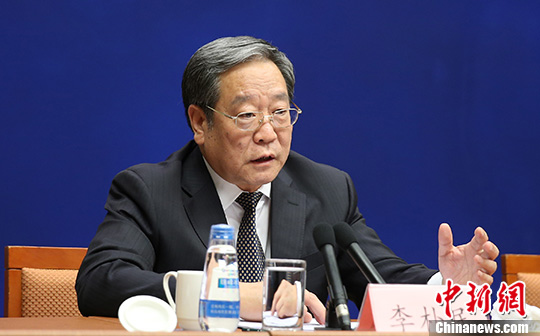 Li Pumin, secretary-general of the National Development and Reform Commission, speaks at a meeting. (Photo/Chinanews.com)