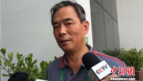 Cai Zhenhua, deputy director of China's General Administration of Sport, speaks at Rio's Olympic Village on media open day Tuesday. (Photo/Chinanews.com)