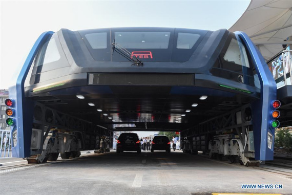 The transit elevated bus TEB-1 is on road test in Qinhuangdao, north China's Hebei Province, Aug. 2, 2016. China's home-made transit elevated bus, TEB-1, conducted a road test running Tuesday.  (Xinhua/Luo Xiaoguang)