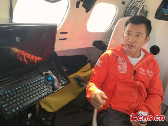 Chinese mariner Guo Chuan sits down for an interview in his trimaran in San Francisco, U.S. on Oct 17, 2016.  (Photo: China News Servcie/ Liu Dan)