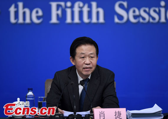Finance Minister Xiao Jie addresses a press conference during the Fifth Session of the 12th National People's Congress in Beijing, March 7, 2017. (Photo :China News Service/Wei Liang)