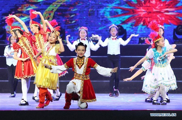 Students perform during a show to celebrate the upcoming International Children's Day at Fendou Primary School in Beijing, capital of China, May 31, 2017. (Xinhua/Hou Jun)