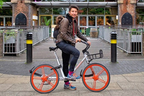 A user rides Mobike's shared bikes in Manchester. (Photo provided to China Daily)