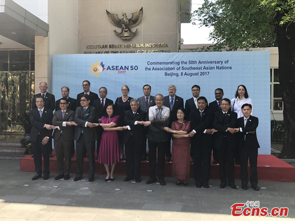 Chinese Assistant Minister of Foreign Affairs Kong Xuanyou (6th L, back row) and ambassadors of ASEAN countries and ASEAN Dialogue Partners in Beijing pose for photos at the Embassy of the Republic of Indonesia in Beijing, China, August 8, 2017. (Photo: Ecns.cn/Liang Meichen)
